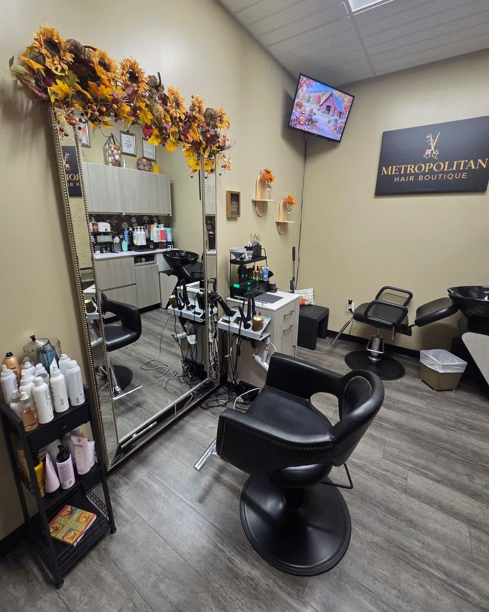 Private styling station with a large mirror at Metropolitan Hair Boutique